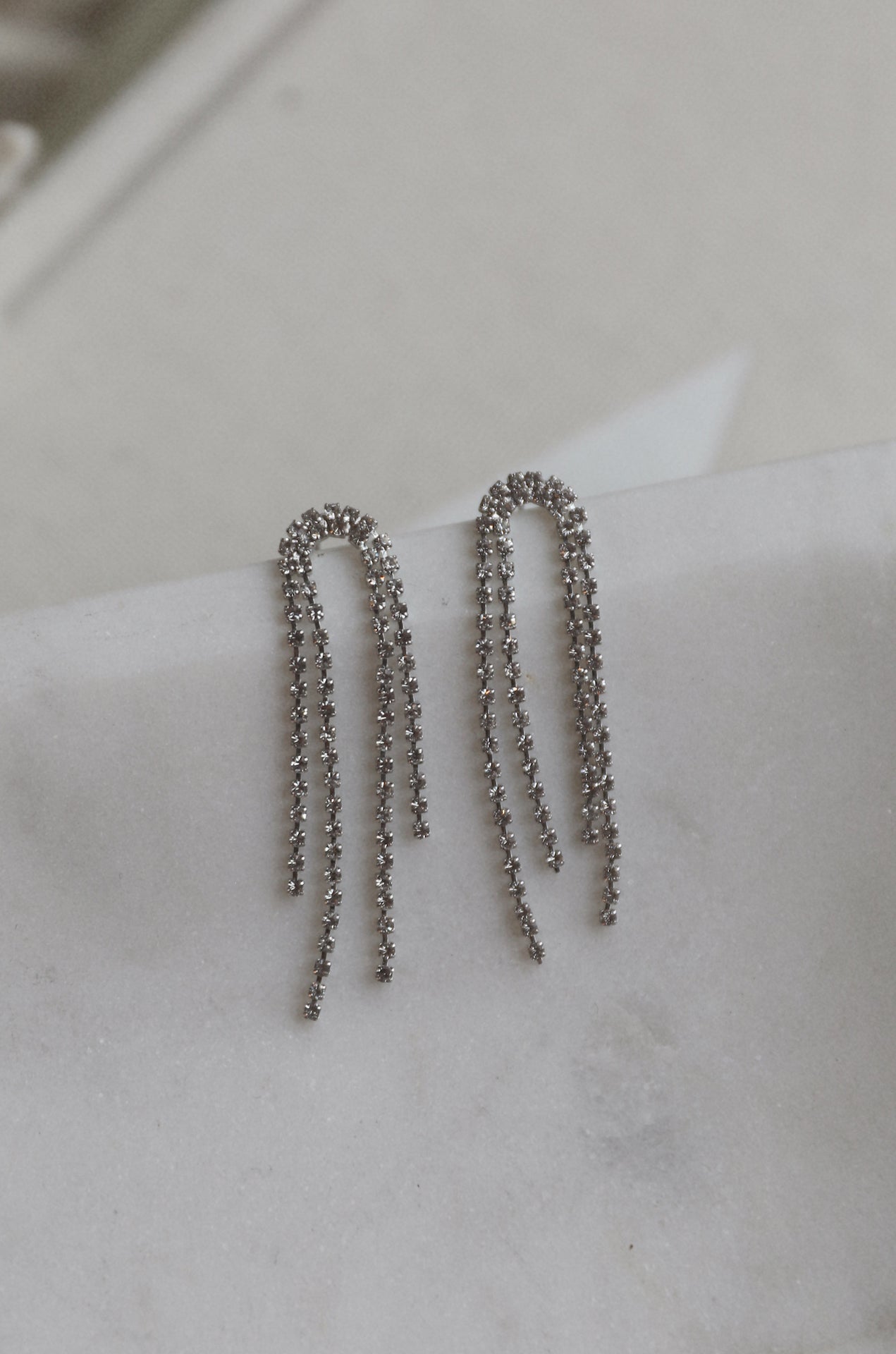 silver diamond rhinestone arch drop earrings