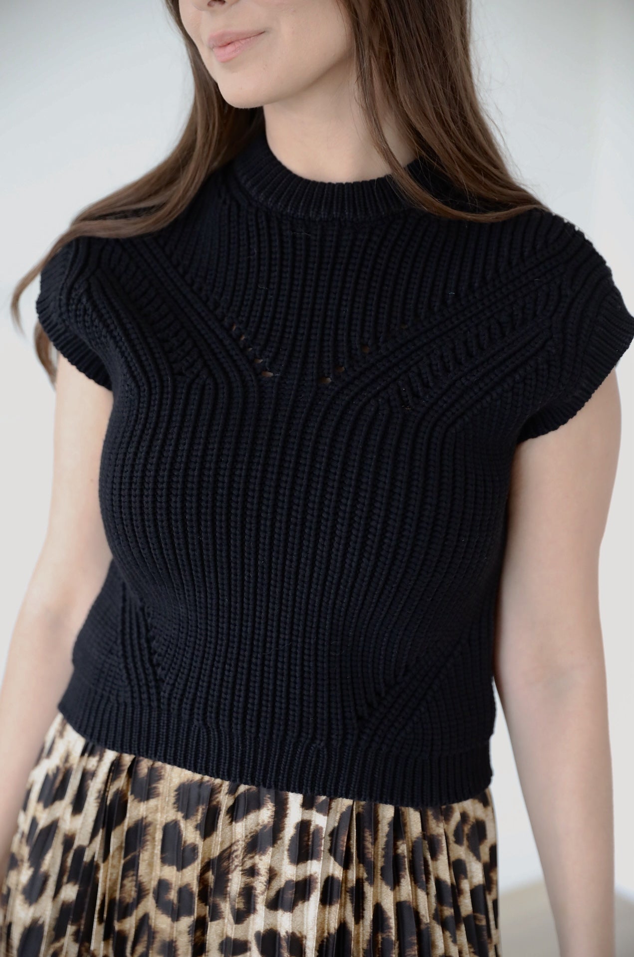 black knit sweater vest