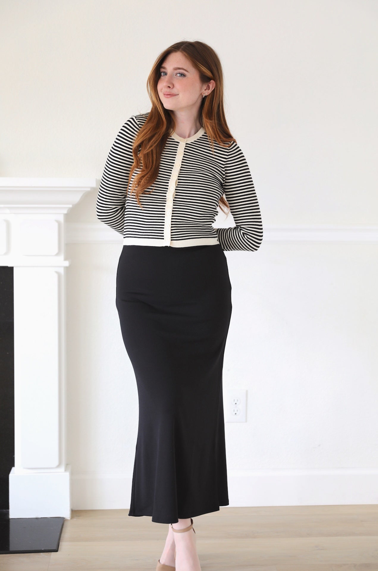 black high waisted midi maxi skirt that has stretch to it