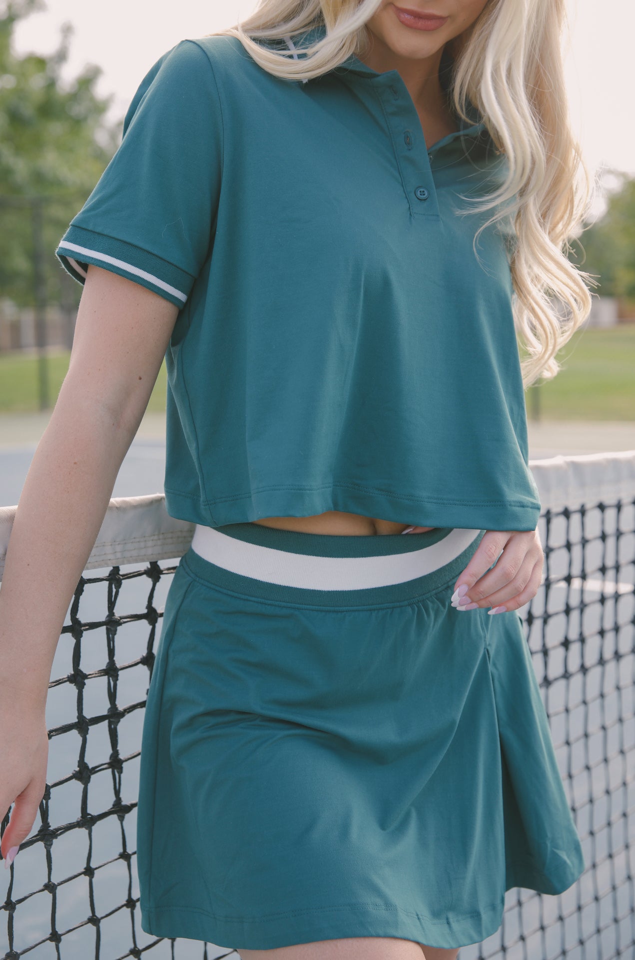 green cropped polo shirt