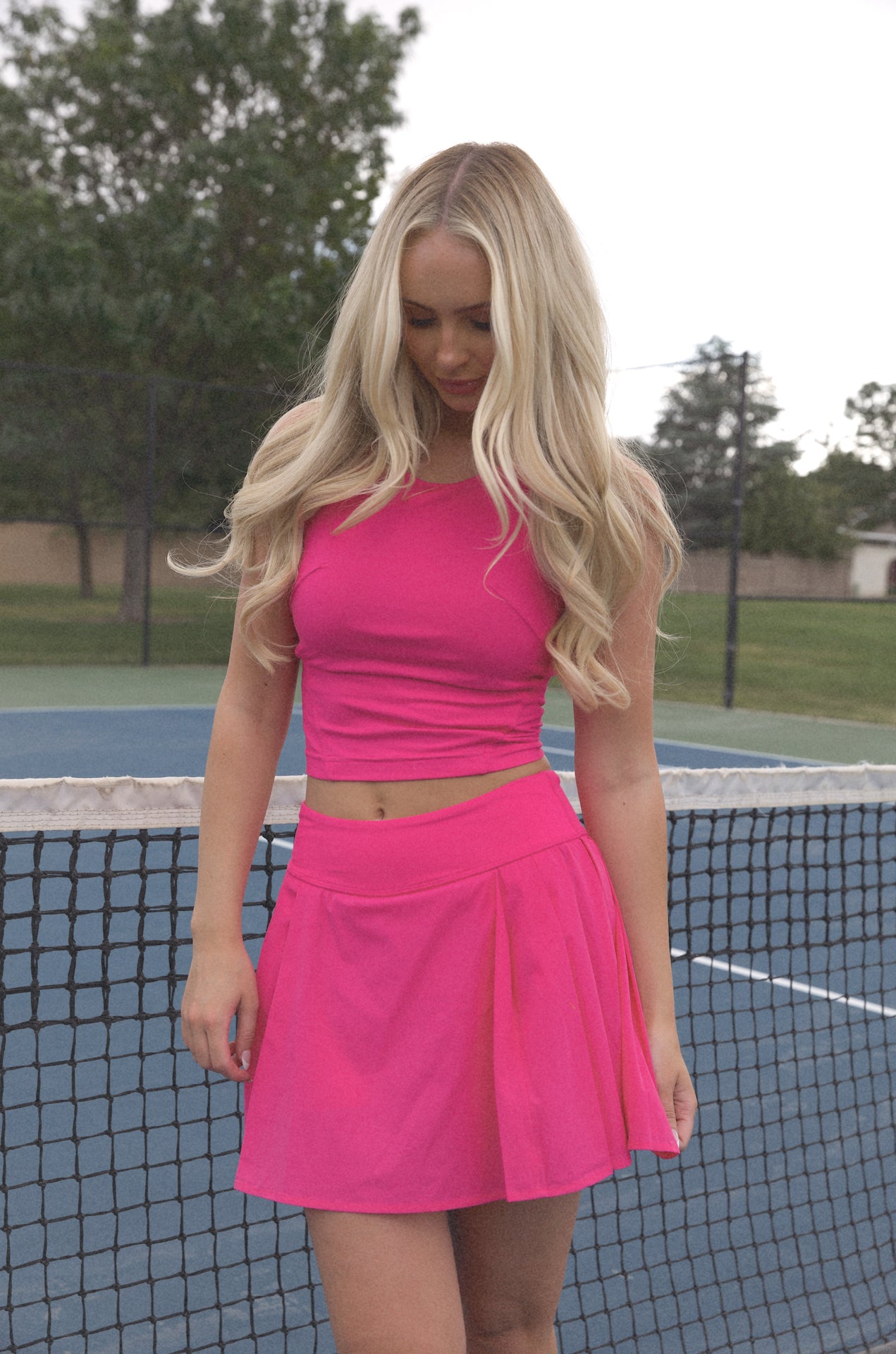 pink pleated golf mini skirt