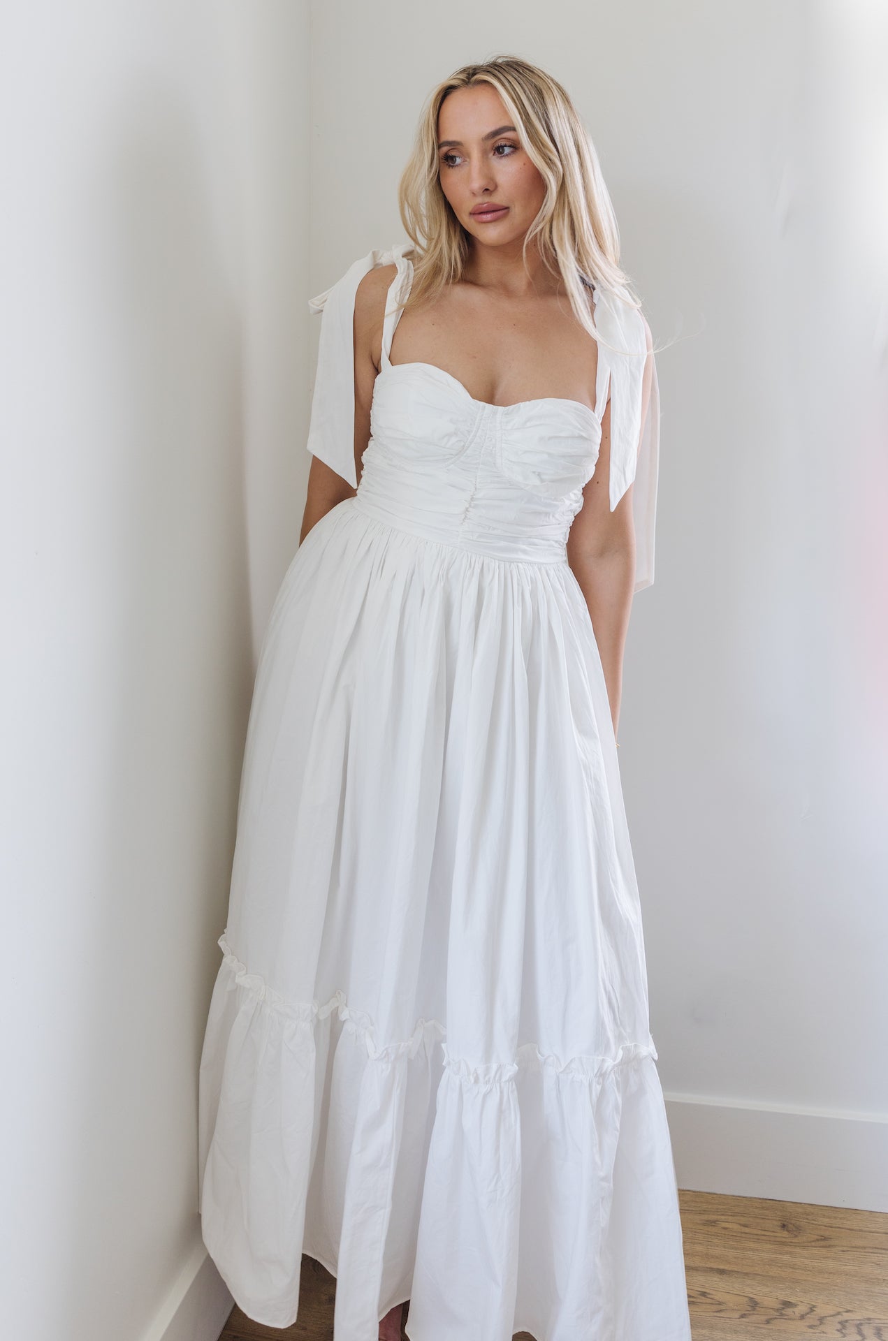 white midi poplin dress with bow on shoulders