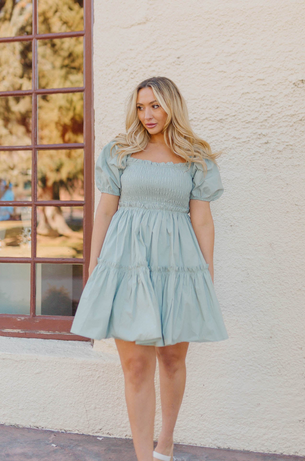 sage short puff sleeve poplin babydoll tiered mini dress