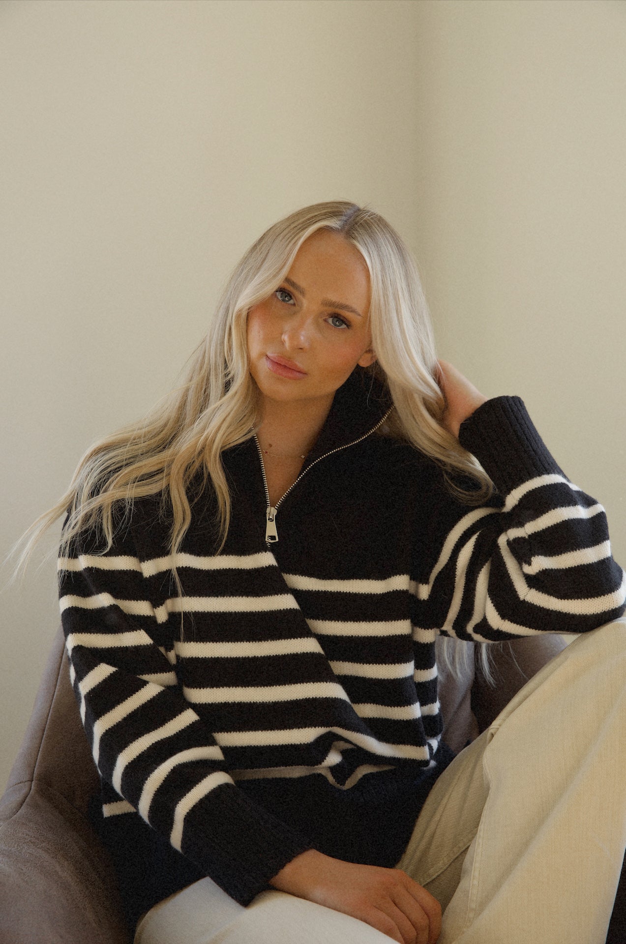 knitted black and white striped half zip sweater