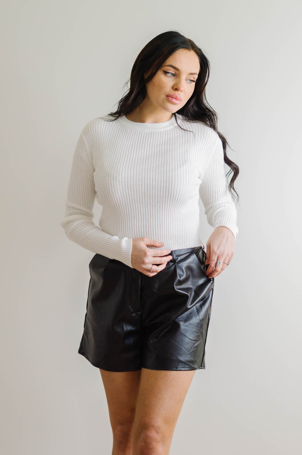 black leather shorts with pockets and pleating