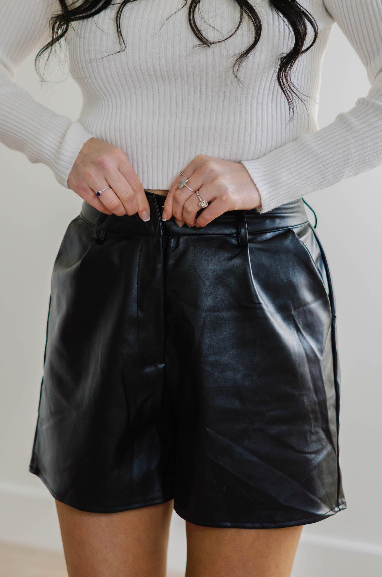 black faux leather shorts