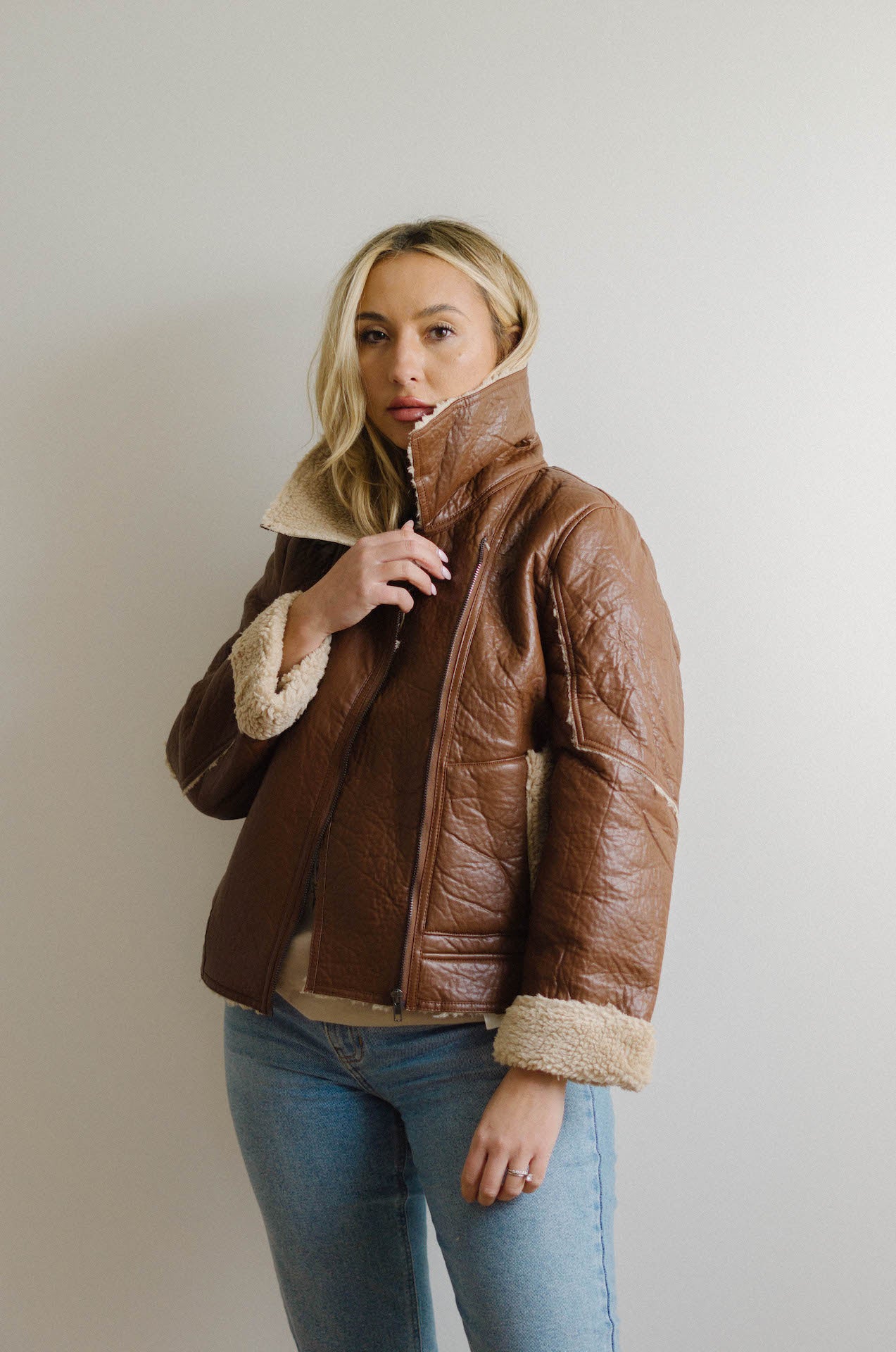 brown faux leather moto jacket with sherpa shearling lining