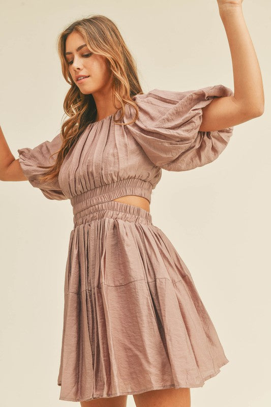 dusty mauve cut out mini dress with puff sleeves and an elastic waist