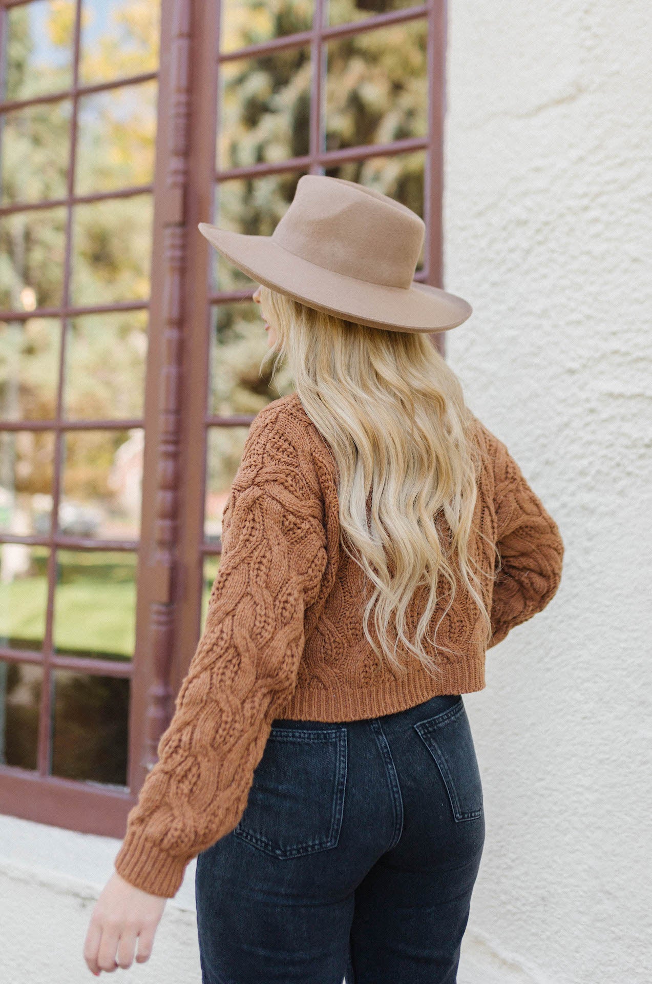 brown twisted braids sweater