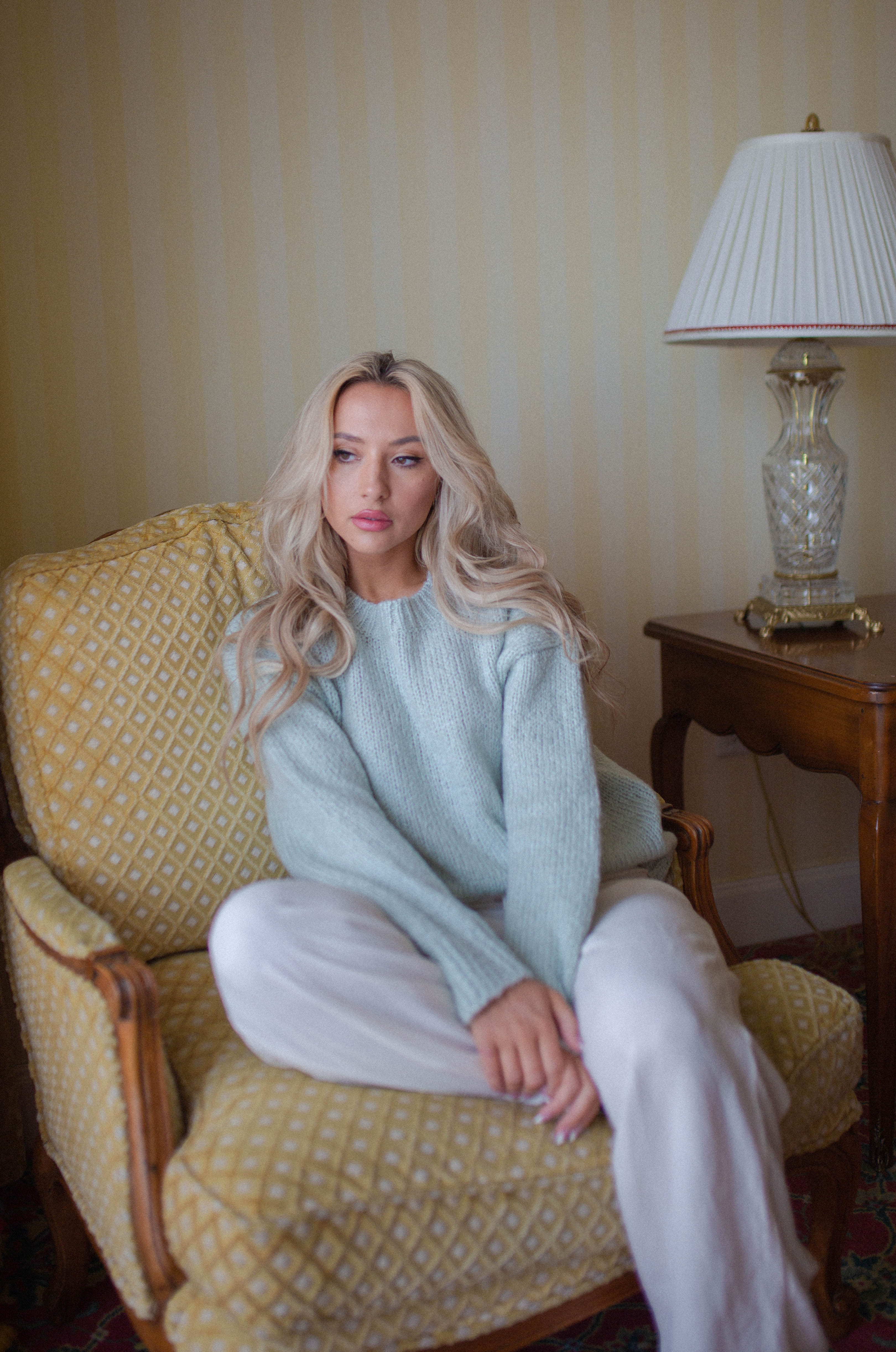 lounge in style in the English Factory Mint Sage Green knit sweater that is perfect for spring.