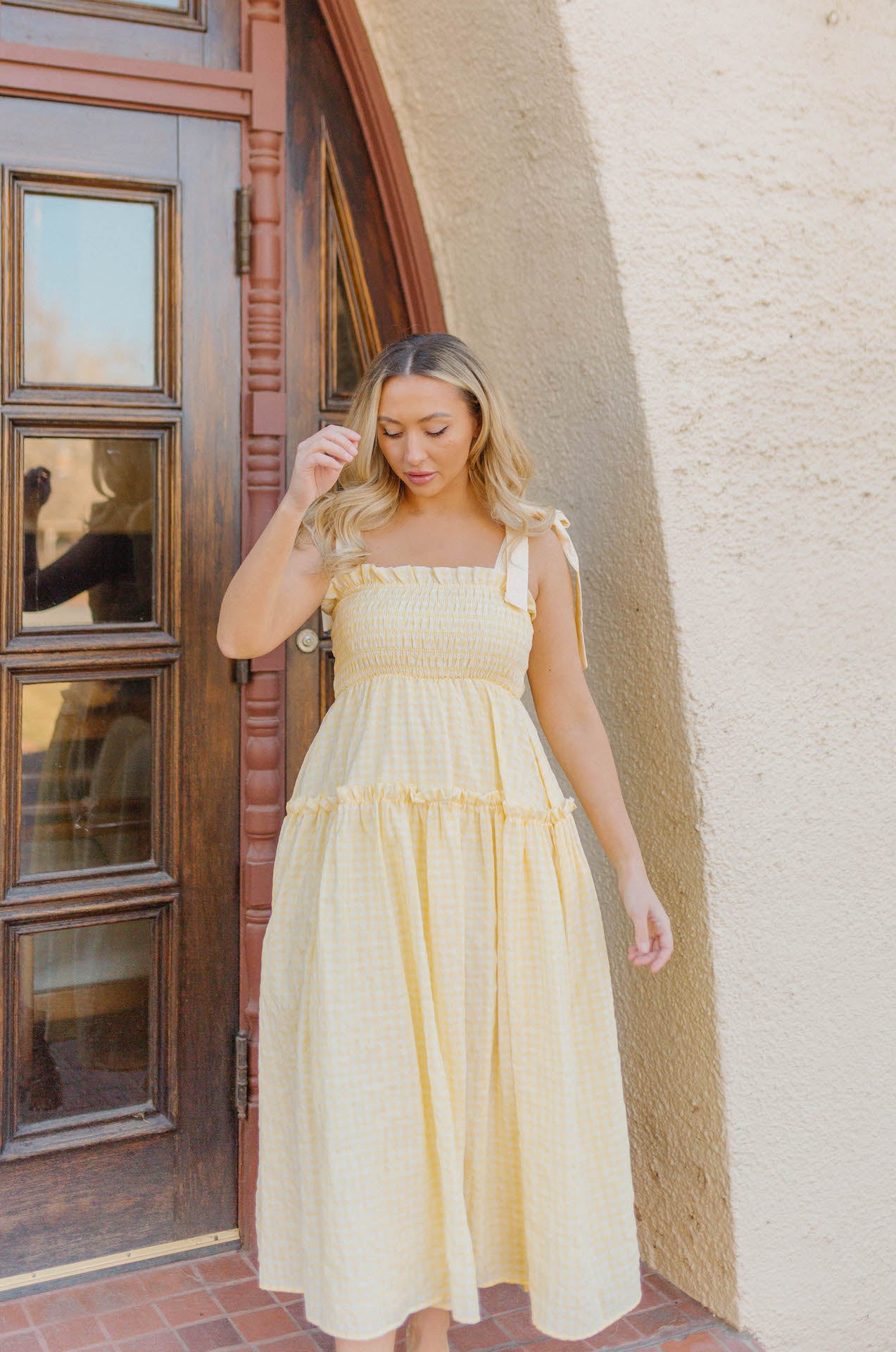 smocked bodice yellow tiered midi dress