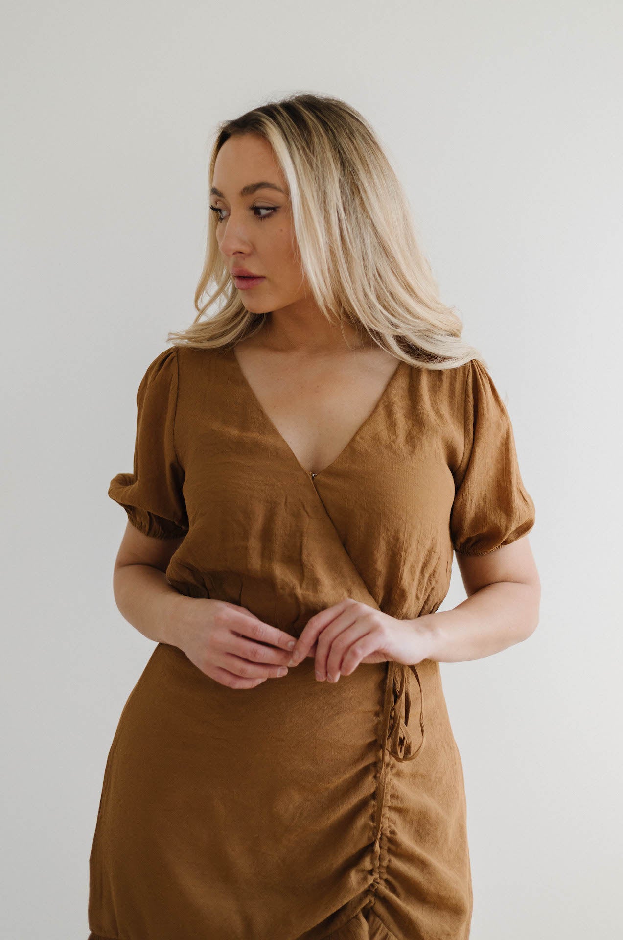 ruched front brown mini dress with sleeves