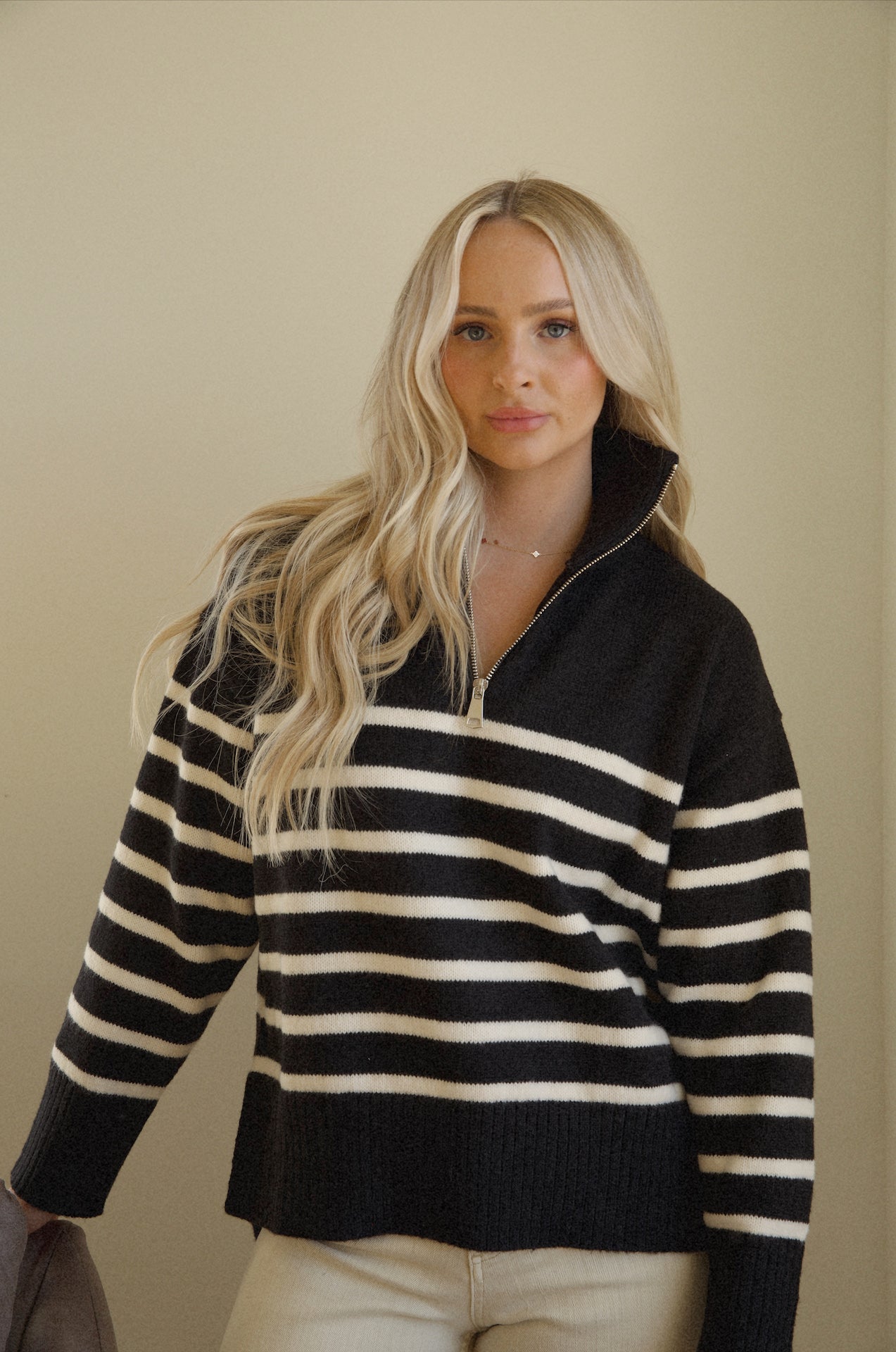 knitted black and white striped half zip sweater