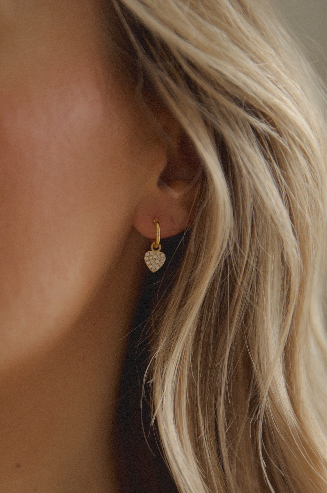14 karat gold heart huggie earrings