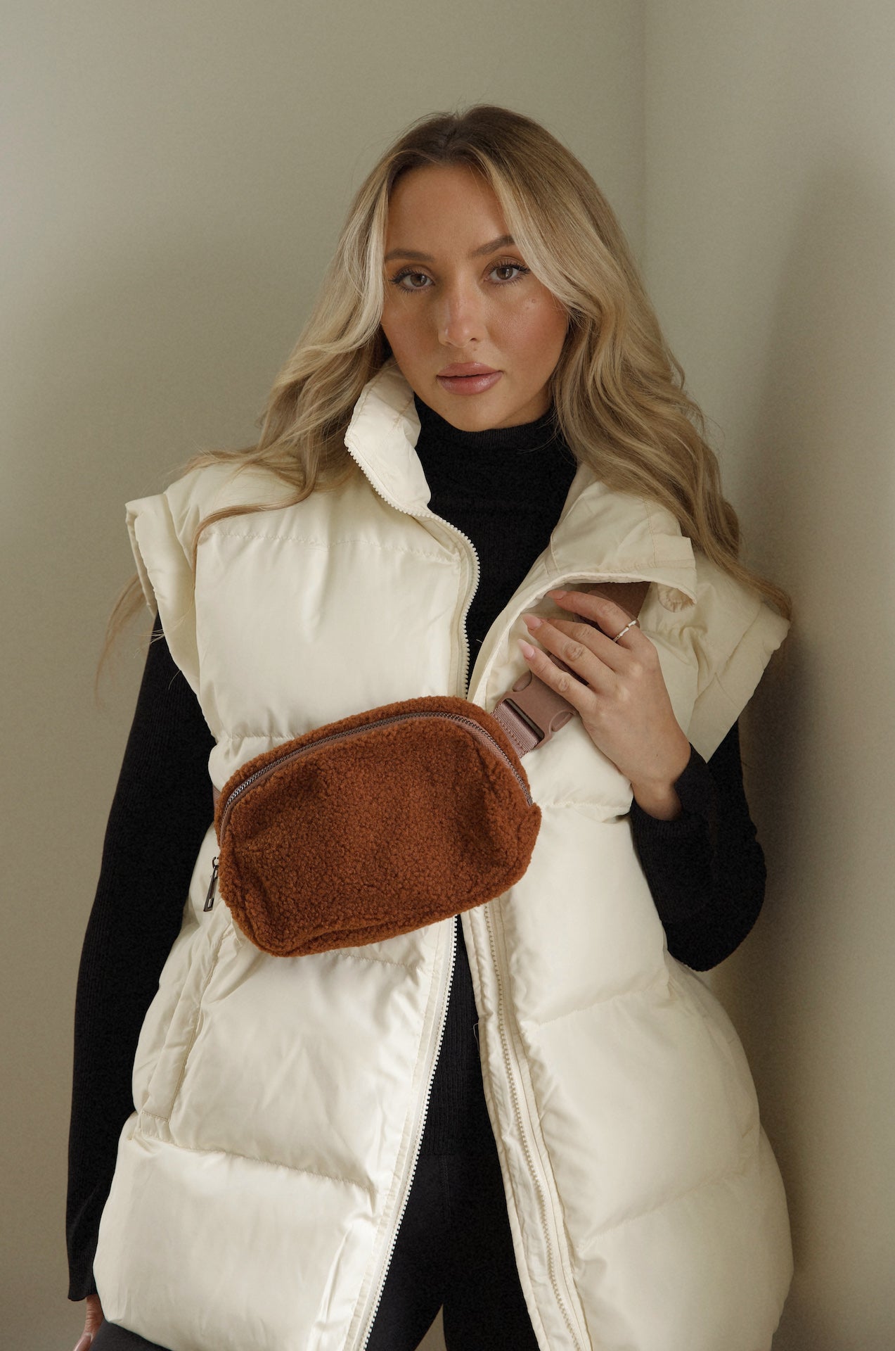 brown sherpa fleece crossbody belt bag that can be worn as a fanny pack