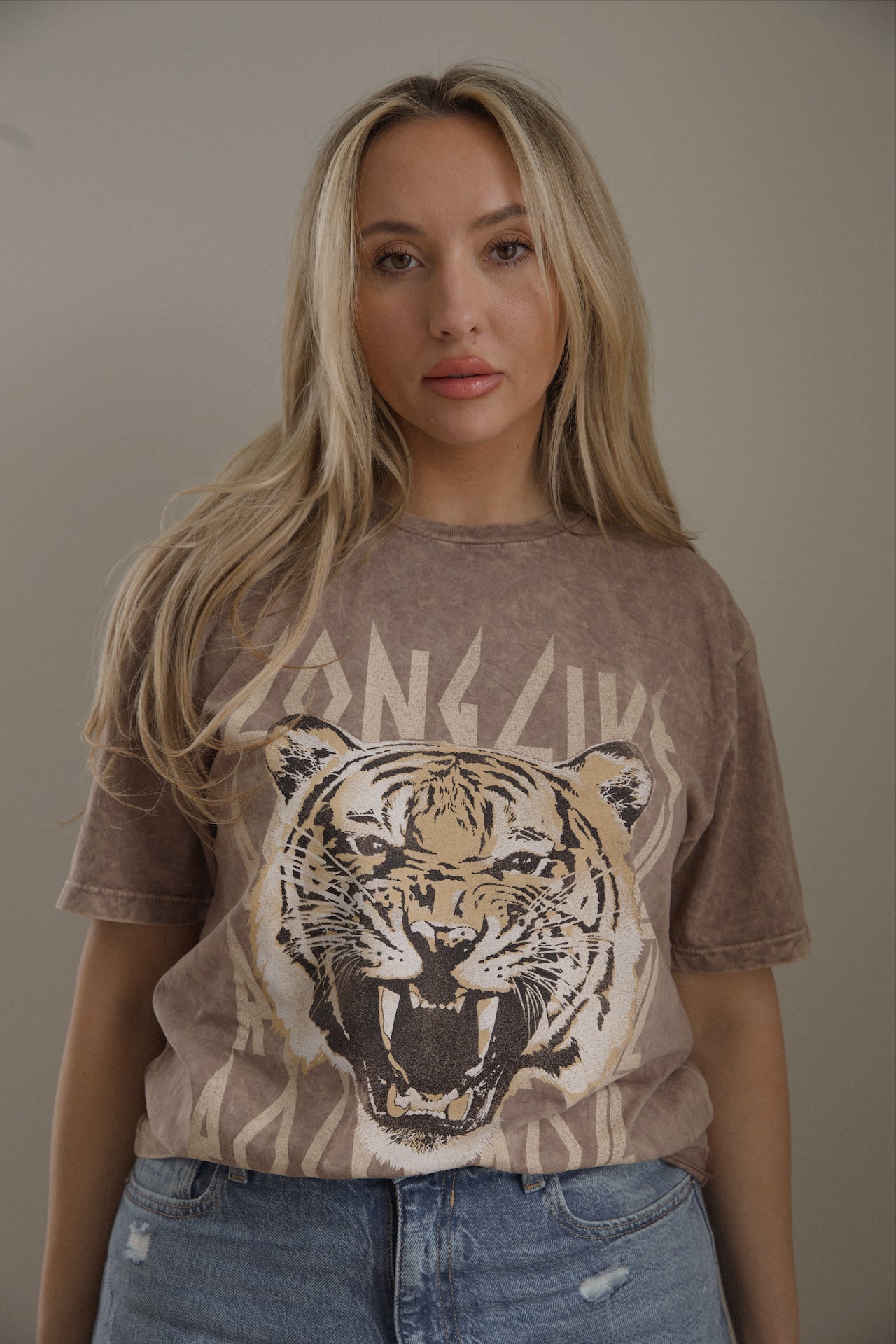 tiger print long live rock and roll graphic tee on a brown cotton tshirt