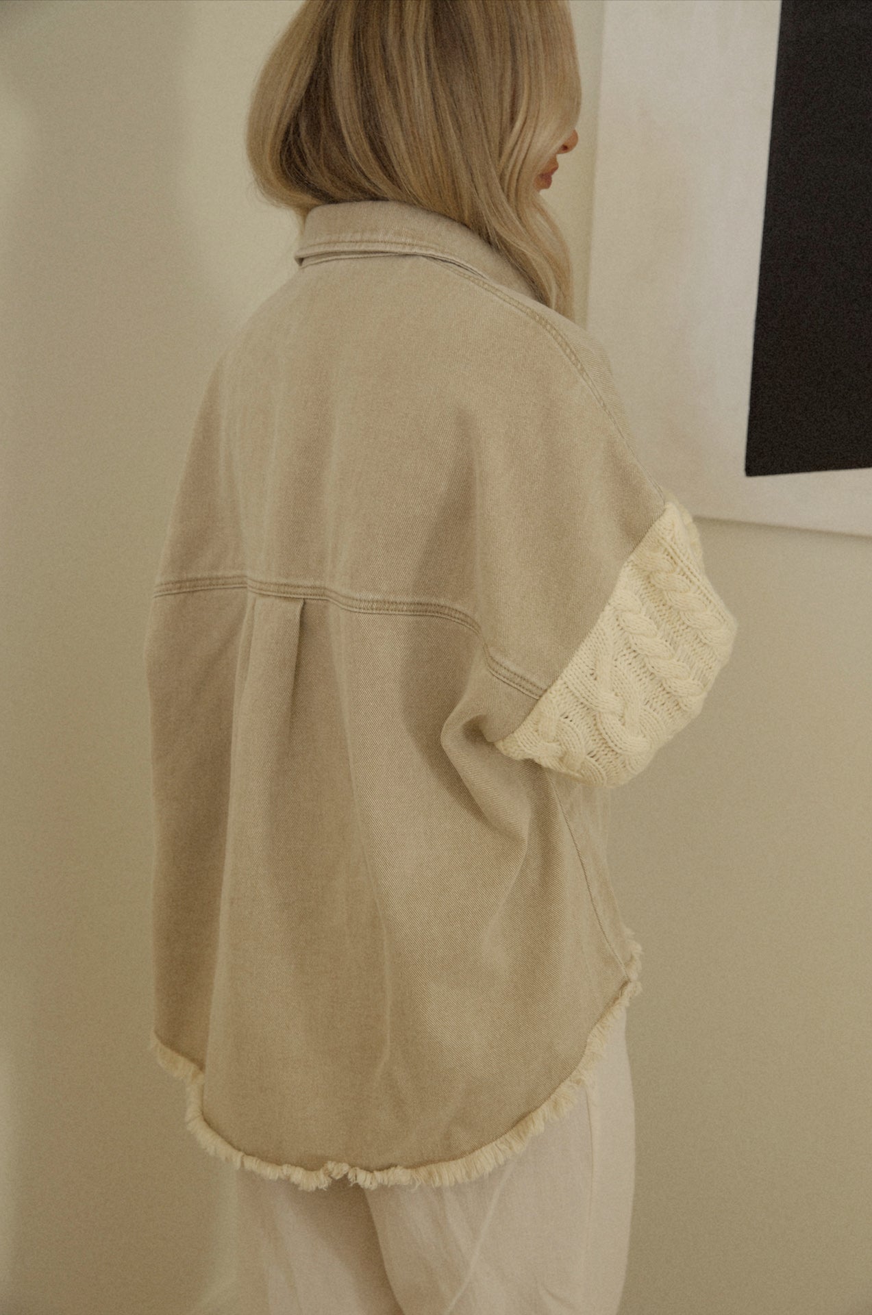 cream tan overshirt with knitted sleeve shacket style
